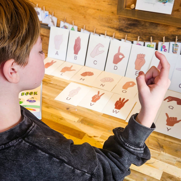 Child using Braille and American Sign Language Kit for Kids